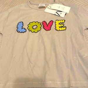 Brand new. Long sleeve shirt from ZARA. Size 18-24 months.